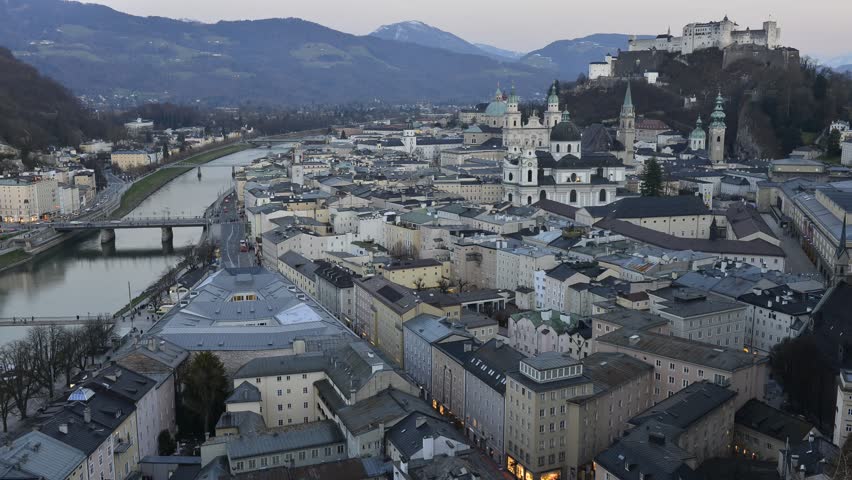 Aerial view of Salzburg, Austria at dusk, evening timelapse video