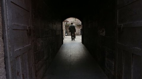 ISTANBUL,TURKEY - March 31,2015 : Unidentified people walk in ancient narrow streets of Eminonu district in Istanbul,Turkey 