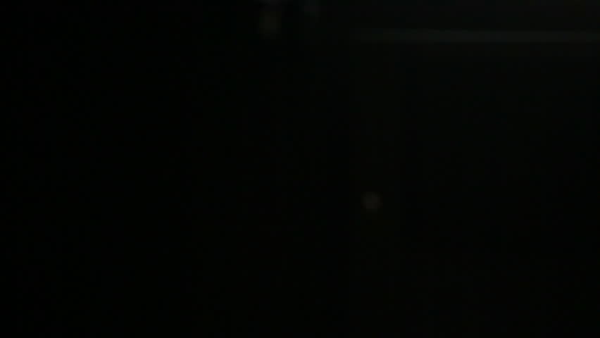 Female hands locking combination to safe in the hotel room