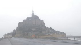 Famous Mont St Michel tourist attraction in northern France region of Normandy 4K 2160p UltraHD footage - Mont Saint-Michel historic symbol of French cultural heritage 4K 3840X2160 UHD video