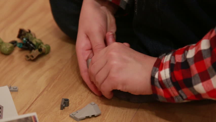 Moscow, Russia, 2015 - Boy playing with Legos