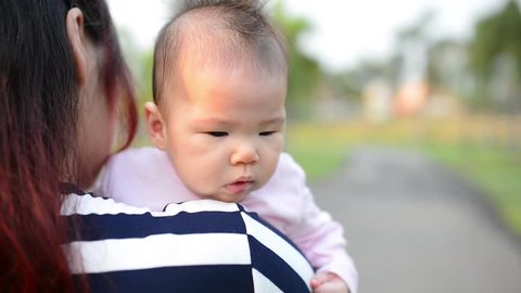 Young mother and baby – Video có sẵn