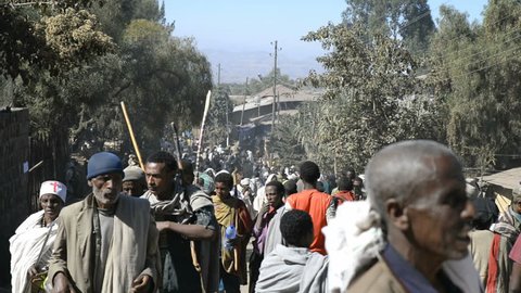 LALIBELA, ETHIOPIA - January 4, 2015 - Pilgrims Pilgrims and local people on Main Street in Lalibela on Januar 4, 2015 in Lalibela, Ethiopia.