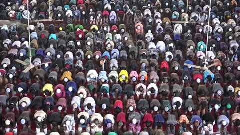 DHAKA, BANGLADESH - 19 DECEMBER 2014: Muslim men attend Friday prayer in the Baitul Mukarram mosque, the largest in Dhaka.