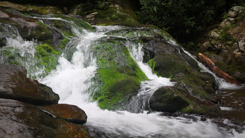 Waterfall Over Mossy Rocks