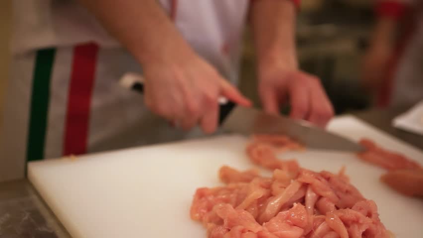 Chef hands Cutting Chicken Fillet. Close up. HD. 1920x1080 | Shutterstock HD Video #9486731