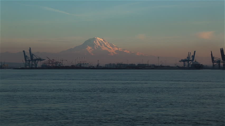Mount Rainier view from boat at sunset with soft haze.
Circa 2013 Commencement Bay, Washington