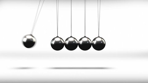 The newton cradle pendulum balls swinging back and forth in a loop