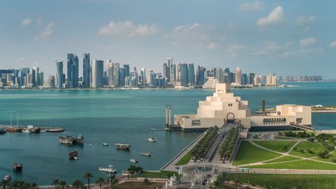Doha, Qatar - CIRCA DECEMBER 2013: Wide-shot POV time-lapse view, Museum of Islamic Art and Dhow Harbor