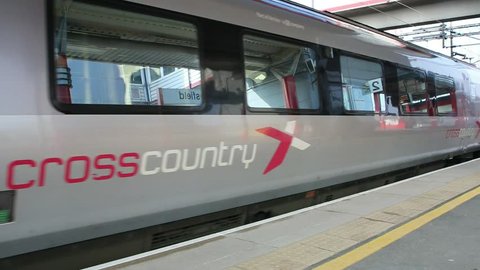 Macclesfield,UK - March 18th 2015: A Crosscountry Voyager train leaves a Macclesfield,UK railway station platform en-route to the south of England.