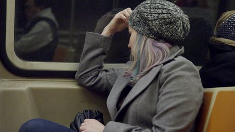 Attractive Lady Commuting in New York City - Woman Thinking, Riding MTA Subway Train - Pretty Urban Girl with Dyed Hair 4K