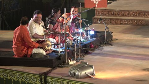 KONARK, INDIA - 3 DECEMBER 2014: An unidentified group plays music during the Konark Dance Festival in India.