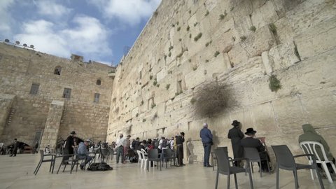 JERUSALEM, ISRAEL - MARCH 19,Orthodox Jews praying in the Western Wall. Jerusalem. Israel 
Slow Motion 