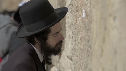 JERUSALEM, ISRAEL - MARCH 19, Jewish Orthodox Man praying in the Western Wall. Jerusalem. Israel
