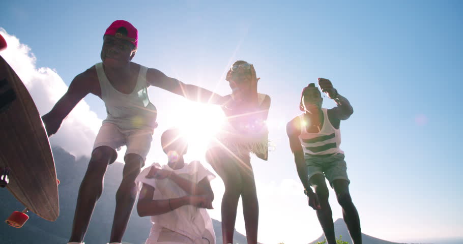 Hand holding a pure glass heart in a healthy natural scene