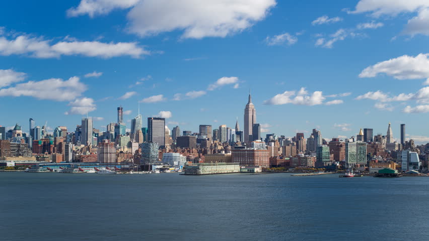 New York - CIRCA NOVEMBER 2014: View of the Empire State Building and Midtown Manhattan across the Hudson River, time-lapse