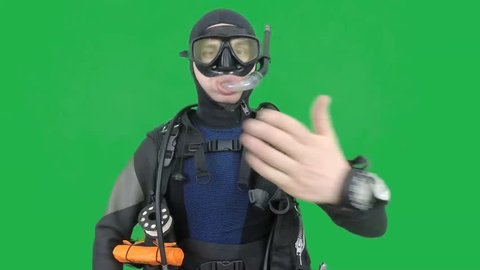 Diving skill- divemaster  shows skill  EXCHANGE SNORKEL ON REGULATOR ,also a available on the green screen all of diving sings from course (open water diver)