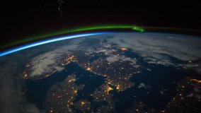 ISS Space view of Europe with ISS Aurora Borealis over the Arctic Ocean, Time Lapse 4K. Created from Public Domain images, courtesy of NASA Johnson Space Center : http://eol.jsc.nasa.gov