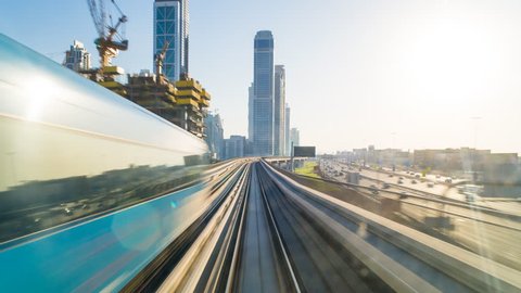 Dubai, UAE - CIRCA DECEMBER 2014: POV time-lapse journey on the driverless elevated Rail Metro System, running alongside the Sheikh Zayed Road