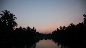 Boating along the Kerala Backwaters before Sunrise (with Audio) - High Definition Video