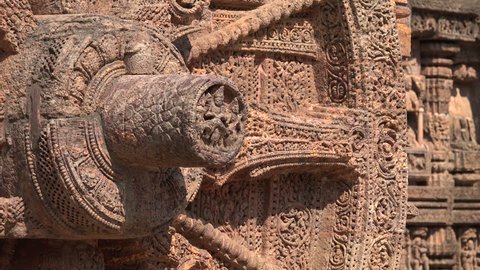 Detailed view of a chariot wheel in the Konark Sun Temple in India.