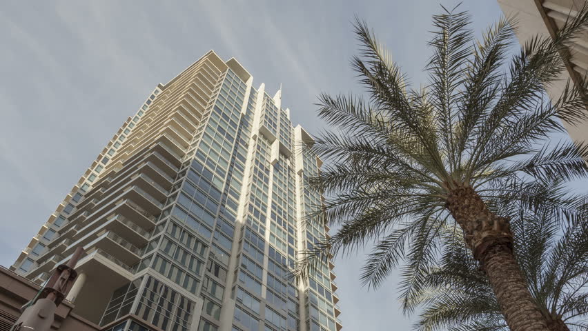 4K Time lapse zoom out of a shadown moving on a skyscraper in Phoenix, Arizona in the evening sun before sunset