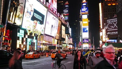 NEW YORK - OCTOBER 09, 2014: New York city, Times Square at evening, on October 09, 2014 in New York