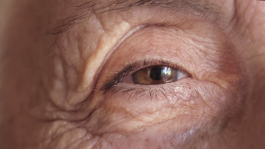 old woman eye: closeup footage on senior woman looks Royalty-Free Stock Footage #9579350