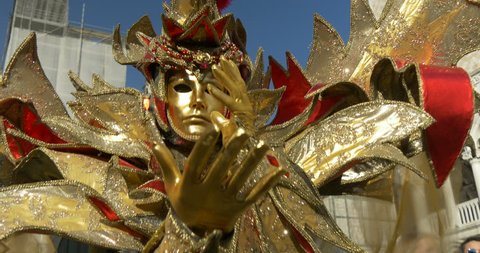 VENICE - CIRCA 2015: Beautiful masks near the Doge Palace during the Carnival of Venice on 16 February 2015 in Venice, Italy