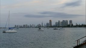 Time Lapse Stock video, footage, moving pictures, vision, of Surfers Paradise Gold Coast on Dusk to night from Southport esplanade across the broadwater.