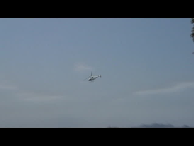 Helicopter Hovering high over Rio at eye level.