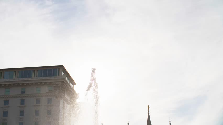Fountain flows in front of the LDS temple in downtown Salt Lake City, UT.