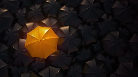 Orange umbrella open and standing out from crowd mass black umbrellas, design background text concept, above point