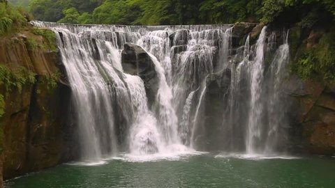 Shihfen Waterfall, Fifteen meters tall and 30 meters wide, It is the largest curtain-type waterfall in Taiwan.