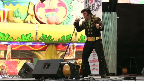 LAS VEGAS, NV - APRIL 22: Elvis performing at outdoor stage on Fremont Street on April 22, 2014 in Las Vegas, Nevada. 