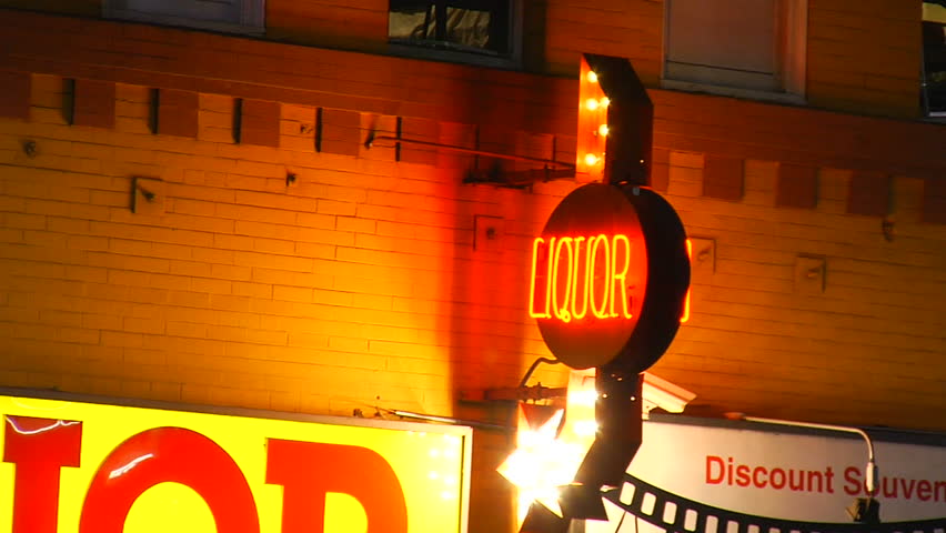 This is a flashy generic liquor store sign at night