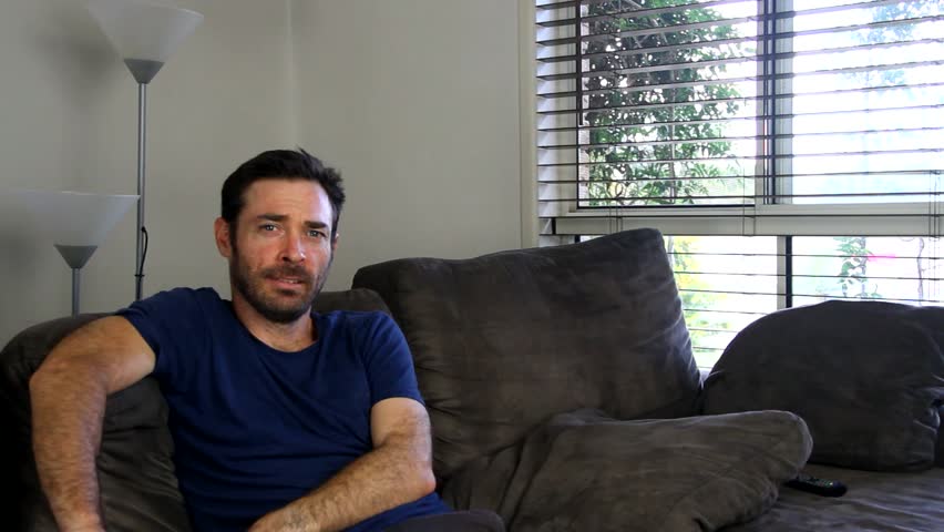 realistic Australian male laughing to point of crying