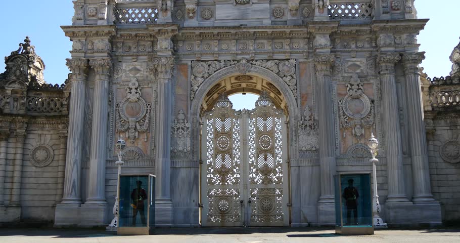 ISTANBUL - APRIL 01: Amazing entrance of the Dolmabahce palace with guardians in front of it April 01, 2015 in Istanbul, Turkey.