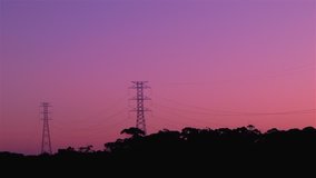 Energy Transmission Power Line Tower Pylon Structures at Sunset.
Power line structure used in electric power transmission and distribution to transmit electrical electricity along large distances. 
 - Powered by Shutterstock - Get 15% off with code: PIKWIZARD15
