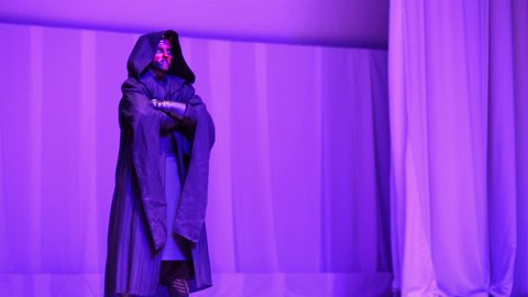 MOSCOW, RUSSIA - MARCH 28, 2015: Star Wars Cosplay show. Star Wars fan dressed as Darth Maul on stage during the festival Star Fans.