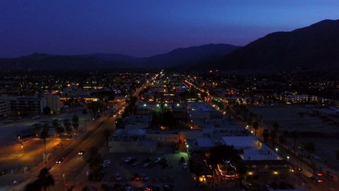 Palm Springs Aerial v2 Flying low over downtown Palm Springs at dusk.