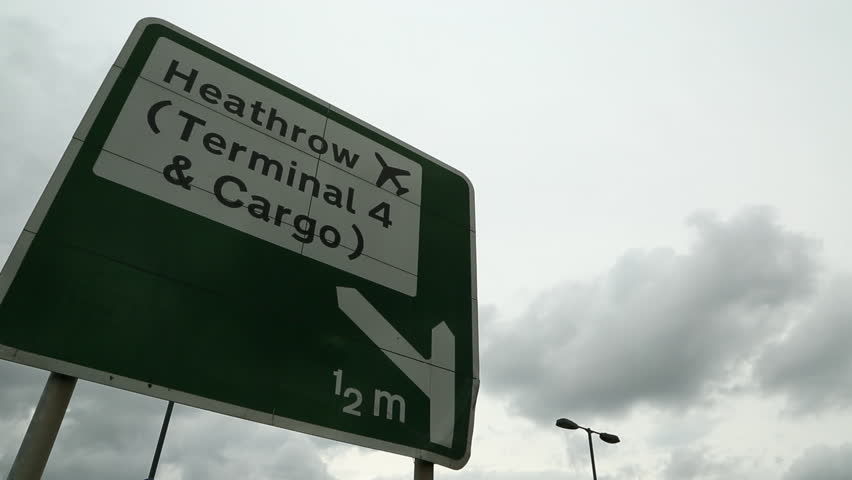 Heathrow Airport Sign with aircraft Flyover
Road sign for london heathrow airport with jet airliner flying overhead Royalty-Free Stock Footage #9669347