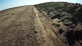 Section between dirt road and field - Powered by Shutterstock - Get 15% off with code: PIKWIZARD15