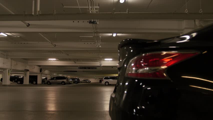 Cars in an underground parking lot at the mall