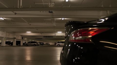 Cars in an underground parking lot at the mall