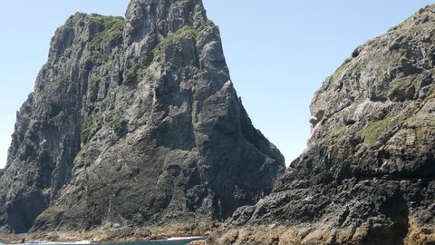 Sailing away from The Hole in the Rock at Percy Island/Motuk?kako Bay of Islands, New Zealand