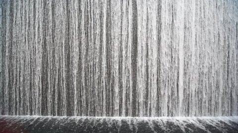 close shot on big beautiful artificial waterfall indoor Stock Video