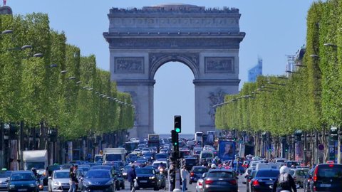 Traffic on Champs-Elysees with Arc de Triomphe in background, Paris, France