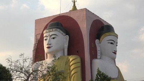 BAGO, BAGO REGION/MYANMAR - FEBRUARY 07, 2015: Four seated Buddha, Kyaik Pun Pagoda. The Four Seated Buddha was built by King Migadippa of Bago in the 7th Century AD.