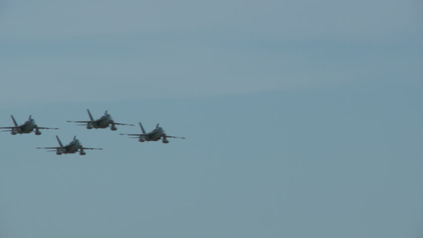 Hornet formation passing left to right